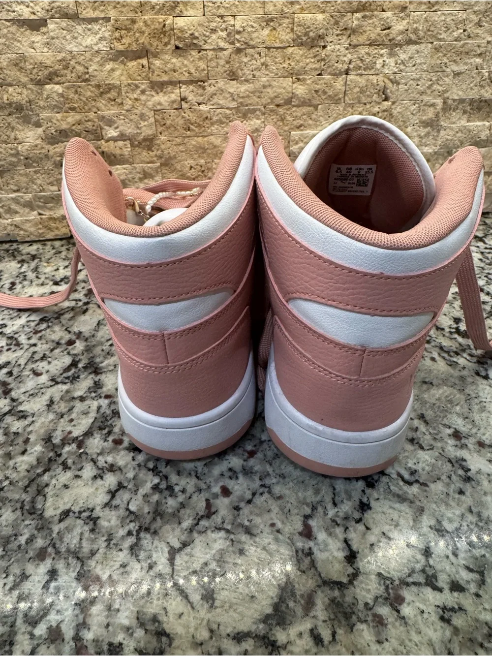 PUMA women’s size 9 Pink and White High-Top Sneakers with bling